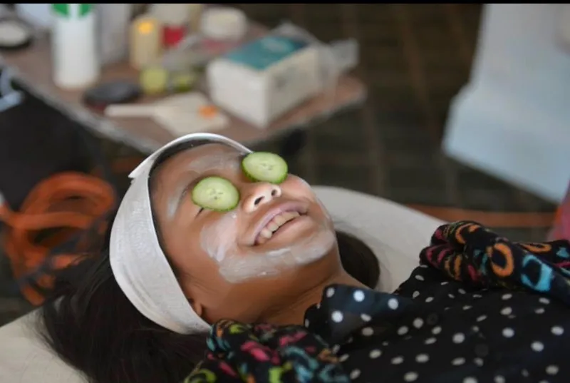 Kids with cucumber face masks at a SPAH party